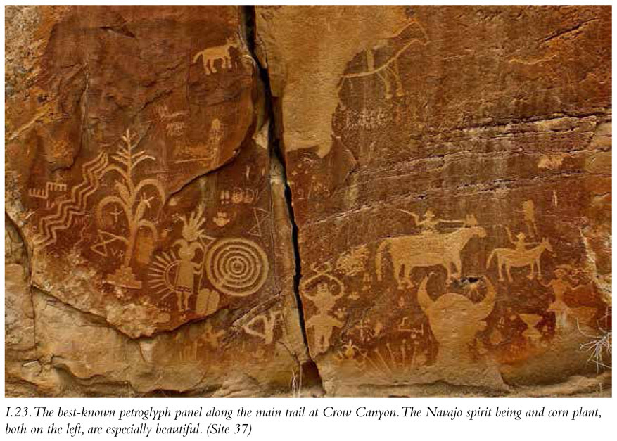 I.23. The best-known petroglyph panel along the main trail at Crow Canyon. The Navajo spirit being and corn plant, both on the left, are especially beautiful. (Site 37)