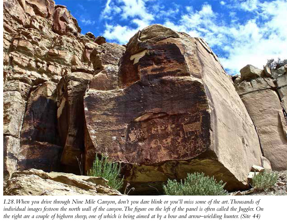 I.28. When you drive through Nine Mile Canyon, don’t you dare blink or you’ll miss some of the art. Thousands of individual images festoon the north wall of the canyon. The figure on the left of the panel is often called the Juggler. On the right are a couple of bighorn sheep, one of which is being aimed at by a bow and arrow–wielding hunter. (Site 44)