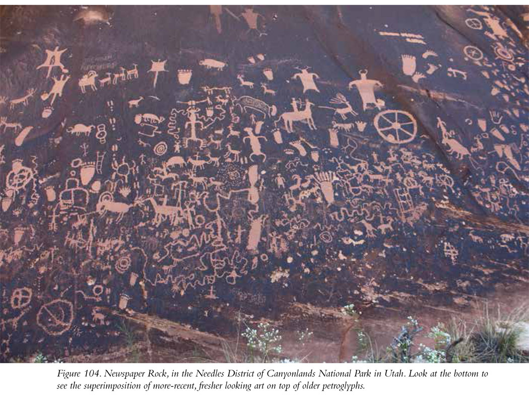 Figure 104. Newspaper Rock, in the Needles District of Canyonlands National Park in Utah. Look at the bottom to see the superimposition of more-recent, fresher looking art on top of older petroglyphs.