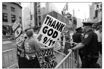 FIGURE 7.2 New York City, September 11, 2014: Members of the Westboro Baptist Church appeared in front of Ground Zero during memorial services on the 13th anniversary of the World Trade Center attacks with signs praising the attack. Source: a katz/Shutterstock.