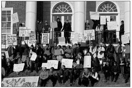 FIGURE 2.3 Media coverage of social issues often reflects broader social divisions and underscores the need for journalists to reflect the communities they cover. Source: AP Photo/The Daily Progress, Ryan M. Kelly.