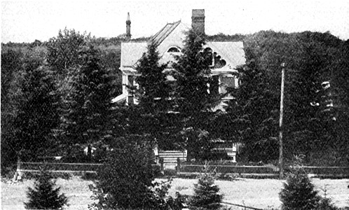 Evergreens adorn old home of Otto Kankel, at Fertile, Minn., in Red River Valley.