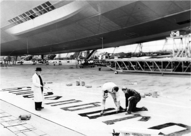  The Hindenburg name is painted in script on a panel prior to being installed on the airship. © ARCHIV DER LUFTSCHIFFBAU ZEPPELIN GMBH, FRIEDRICHSHAFEN