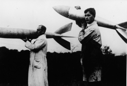 Rudolf Nebel, at left, and von Braun, age eighteen, carry their group’s ...