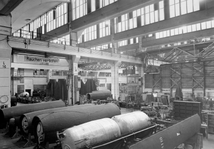 A row of finishedV-2 propellant tanks in a Peenemünde plant in 1944 illustrates that limited V-2 production ...