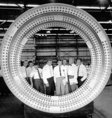 Von Braun, fourth from left, leads the original group of seven Mercury astronauts on a tour of Redstone Arsenal in 1960. The group inspects the ...