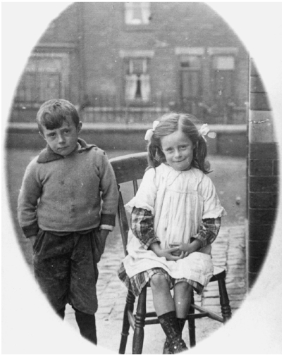 3.12 Edward and May Bond taken by a street photographer outside their home in Manchester, c. 1912