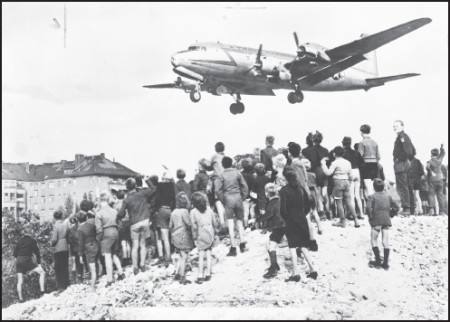 US transport plane landing in West Berlin during the 1948–1949 blockade. 