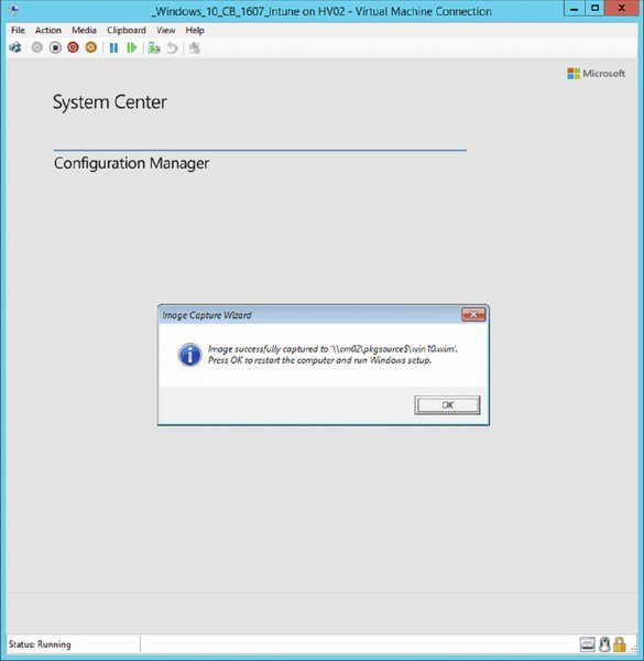 Screenshot of a dialog box with a prompt box displaying image capture success message in system center.