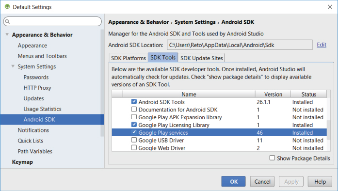 Default Settings window with a drop-down list at the left side with selected Android SDK option displaying SDK platforms, SDK tools, and SDK update sites tabs. Under SDK tools tab are selected check boxes.