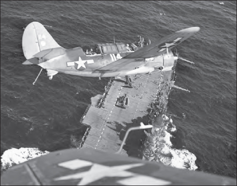 U.S. Navy Curtiss SB2C Helldiver returns from a strike on Japanese shipping