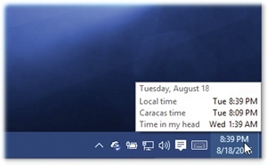 To see the time for the additional clocks, point without clicking over the time in the system tray. You get a pop-up displaying the time on the additional clock (or clocks) that you configured.