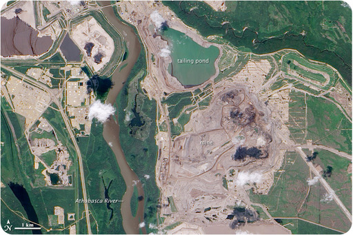 A satellite image of an oil-sands mine in Canada