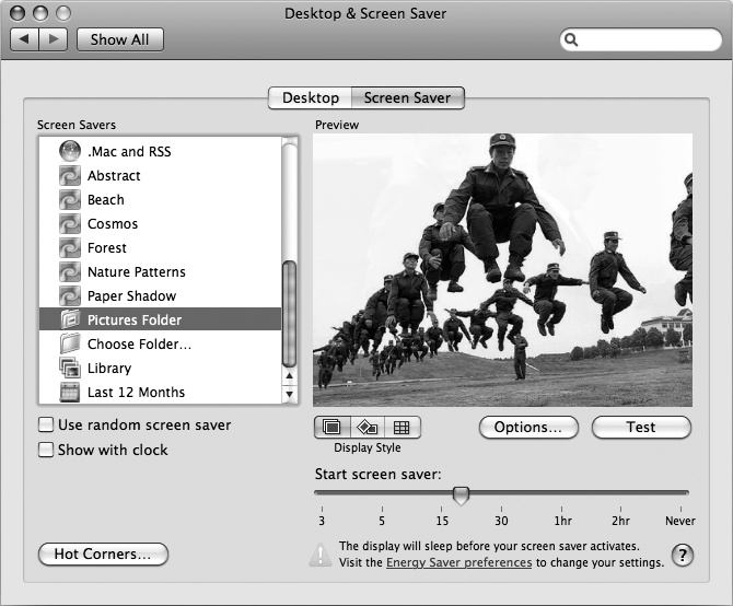The Desktop & Screen Saver window lets you preview the images of your slideshow.