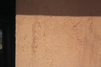 Stucco wall of author’s fake adobe house.