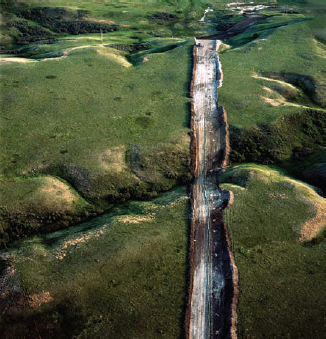 Terry Evans, Oil pipeline right-of-way, Mountrail County, ND, June 2011...