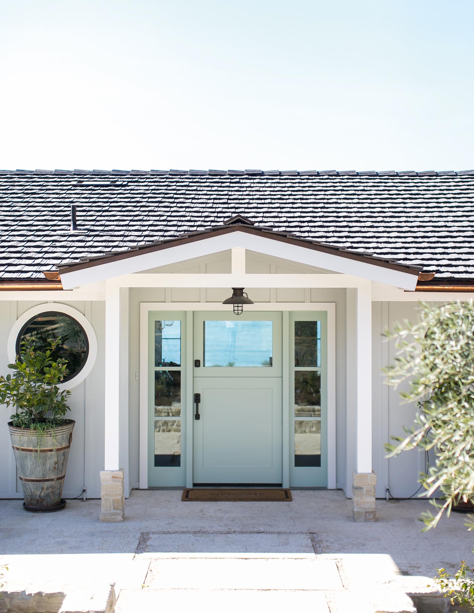 Photo of exterior doorway of a single-floor cottage.