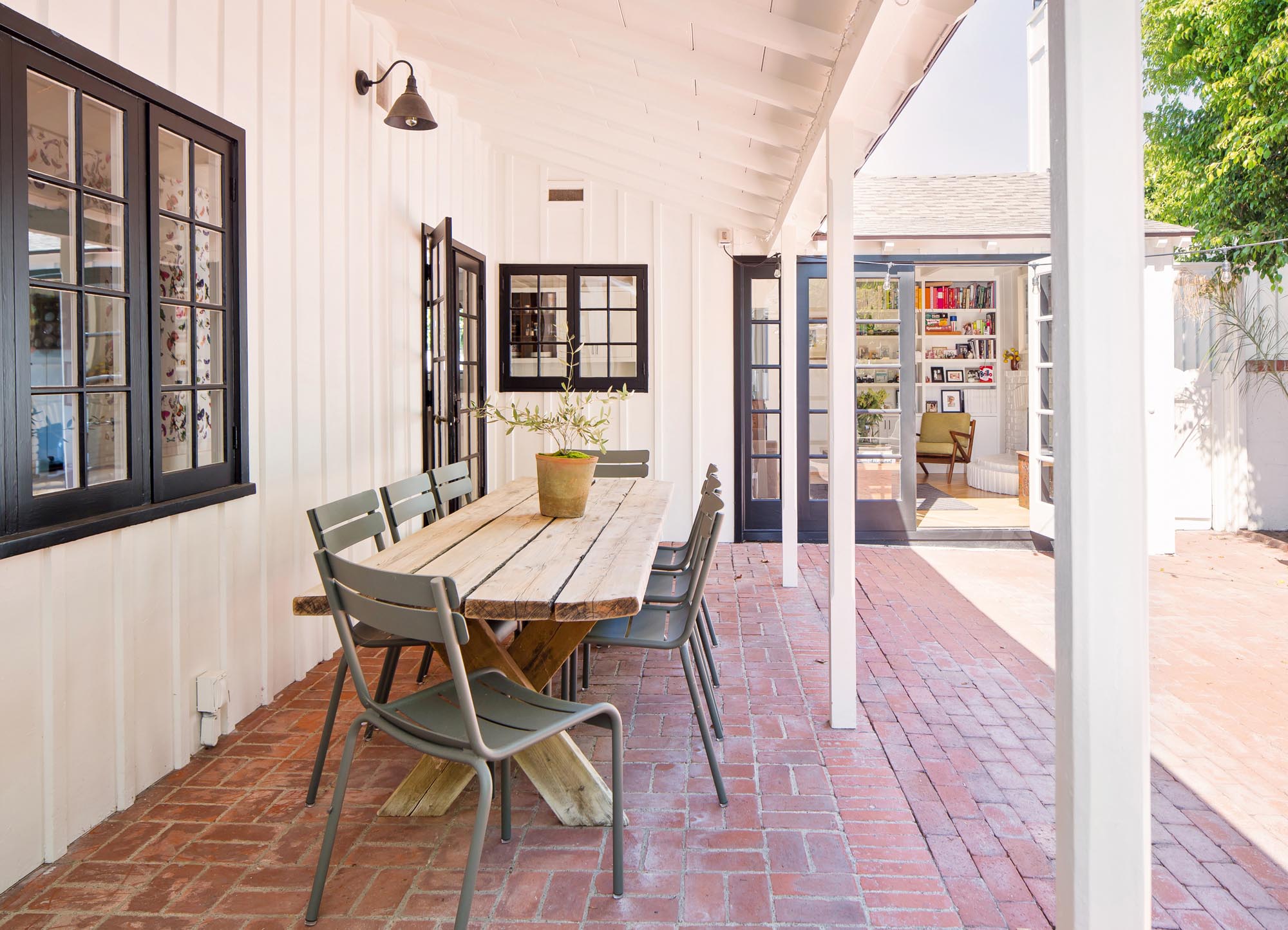 The family room and connecting hallway French doors open onto a private and high-fenced courtyard perfect for personal reflection, dining or entertaining.