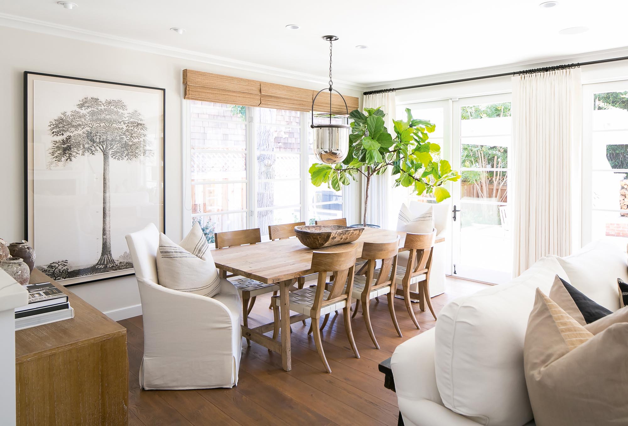 Photo of a dining area surrounded by windows.