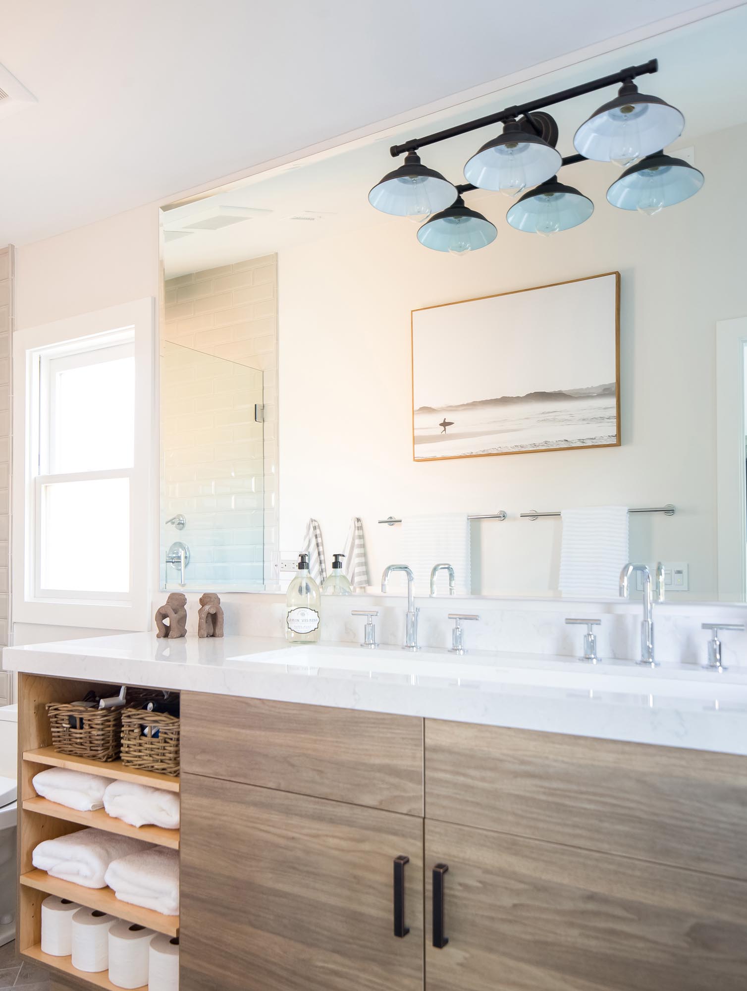 Photo of another view of the sinks and cabinetry in the bathroom.