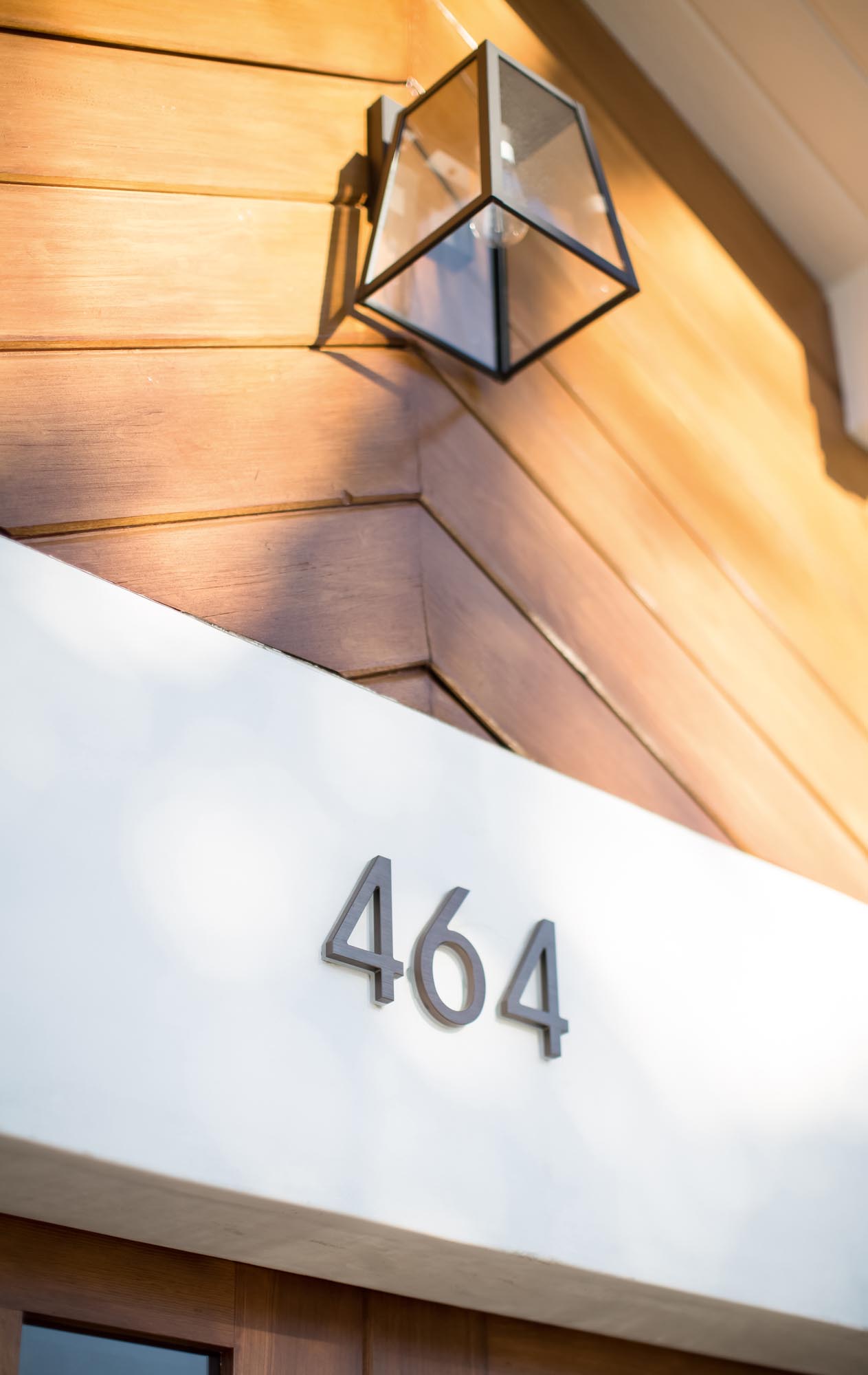 Photo of lantern and woodwork above the garage.