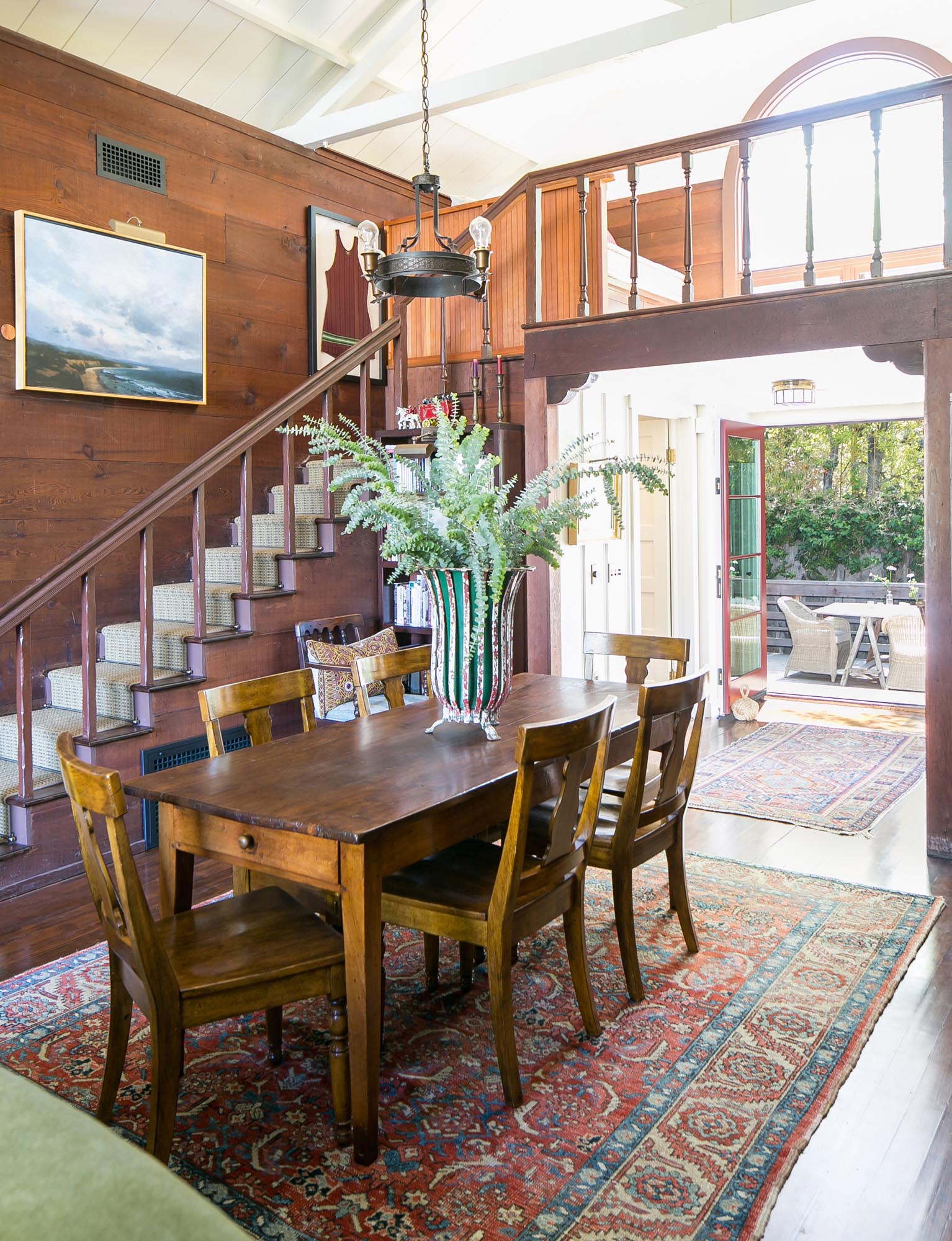 Photo of a dining area with vintage table and chairs.