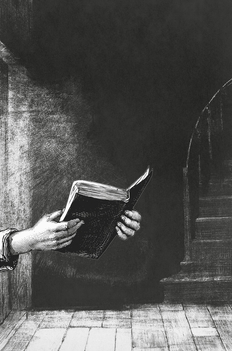 Two hands are holding an old book in a  dark room with a staircase in the background.