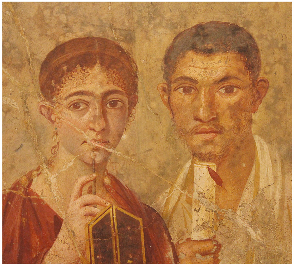 Figure 1.4. Portrait of a Roman couple. In this fresco, found in a Roman house in Pompeii, the woman holds a wax tablet and stylus, indicating that she was educated, and the man holds a scroll, which may symbolize an administrative position in Pompeii. (National Archaeological Museum, Naples)