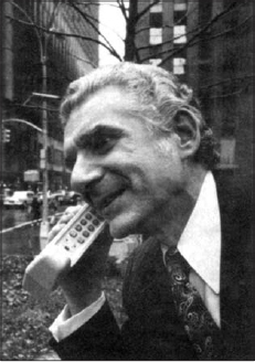 Martin Cooper with Motorola’s DynaTac prototype in 1973