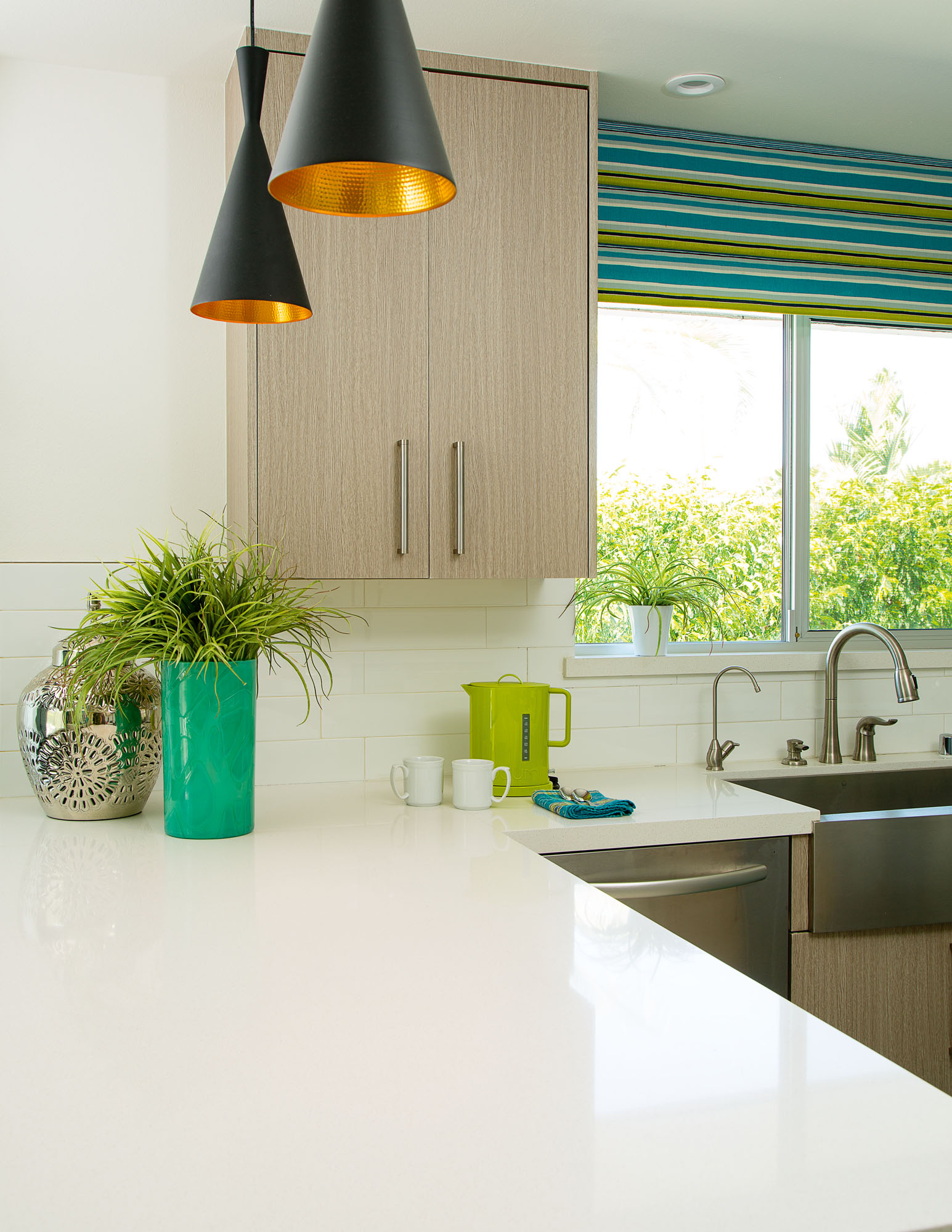 Photo of kitchen with white counters.