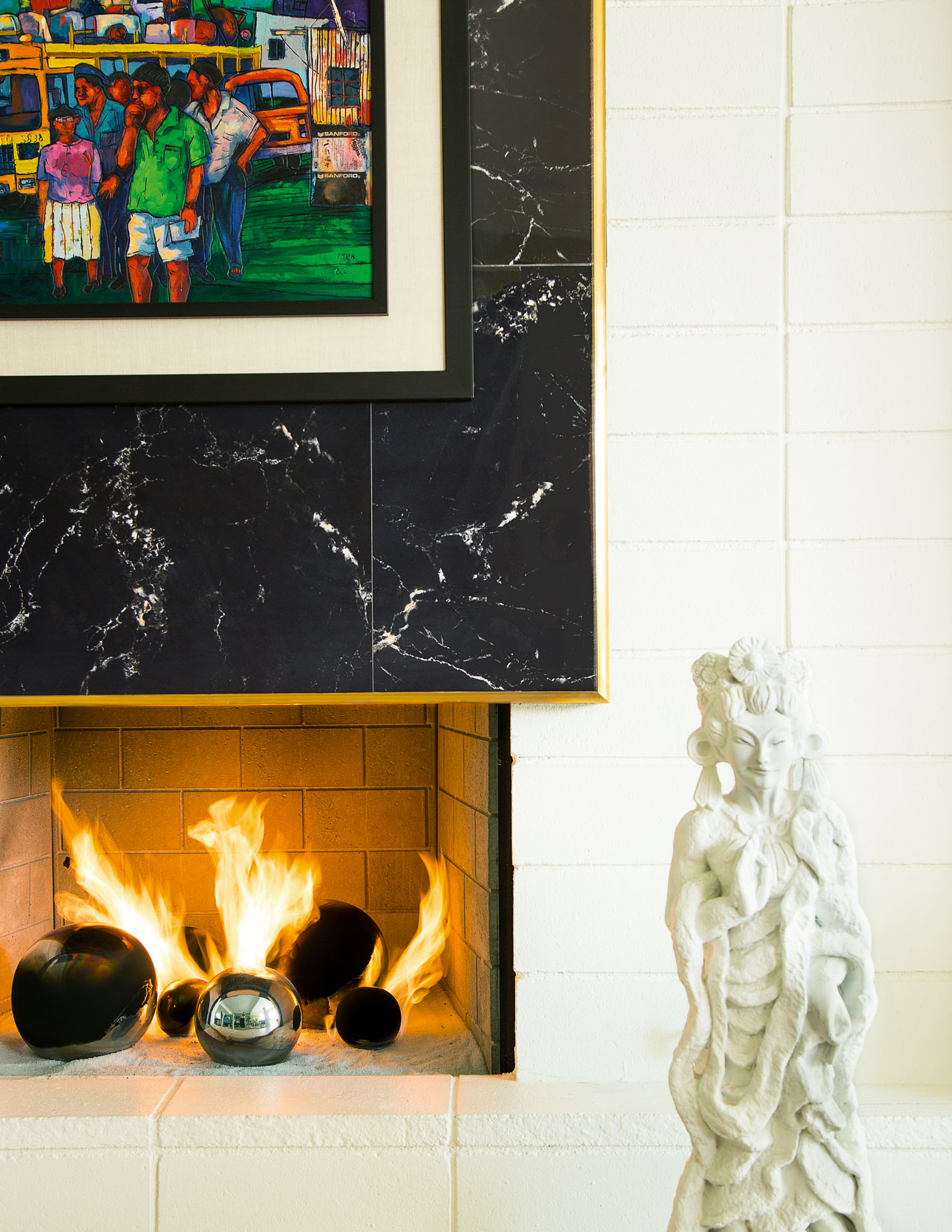 Photo of black and white fireplace.