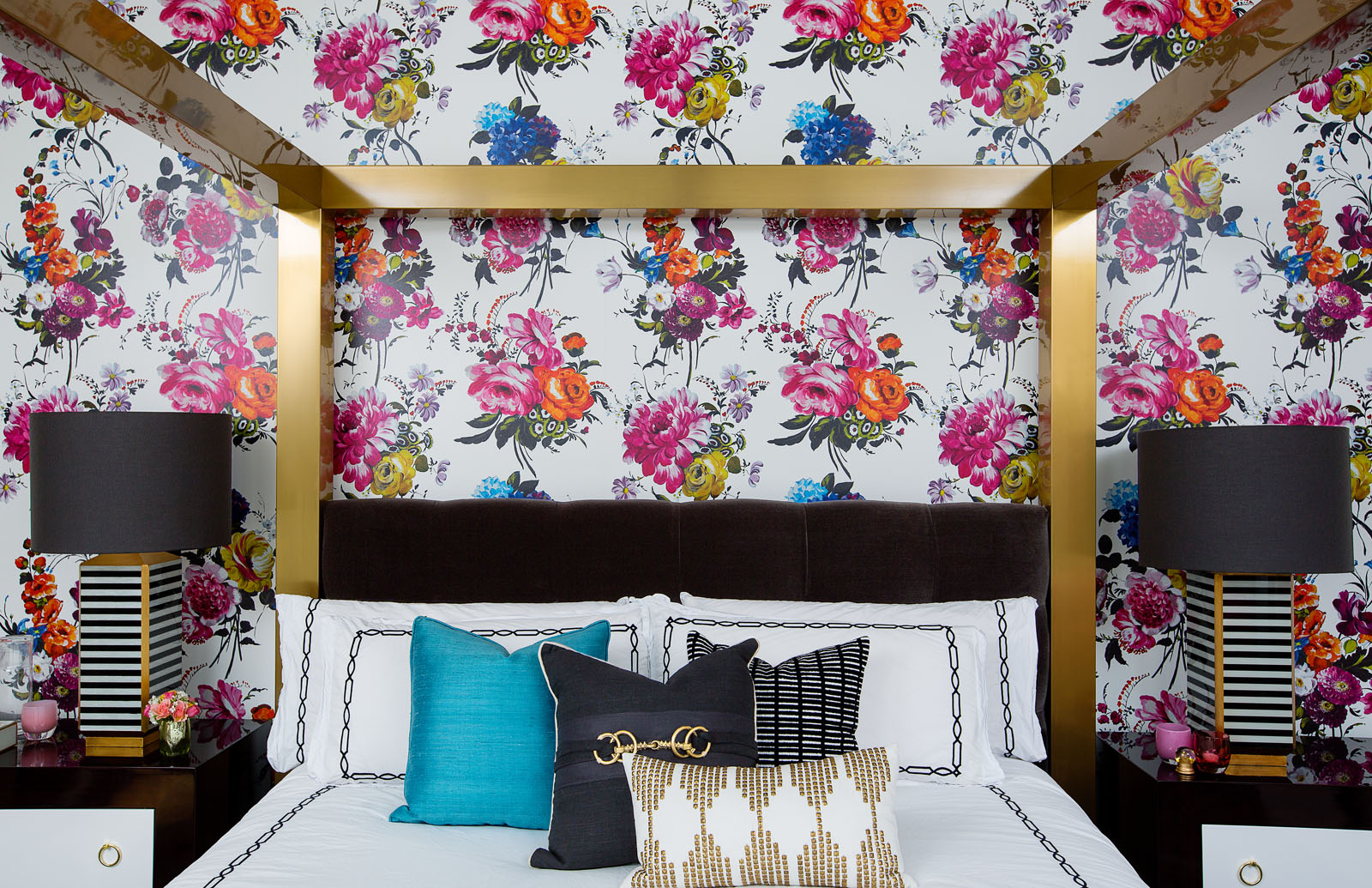 Photo of room with floral wallpaper.