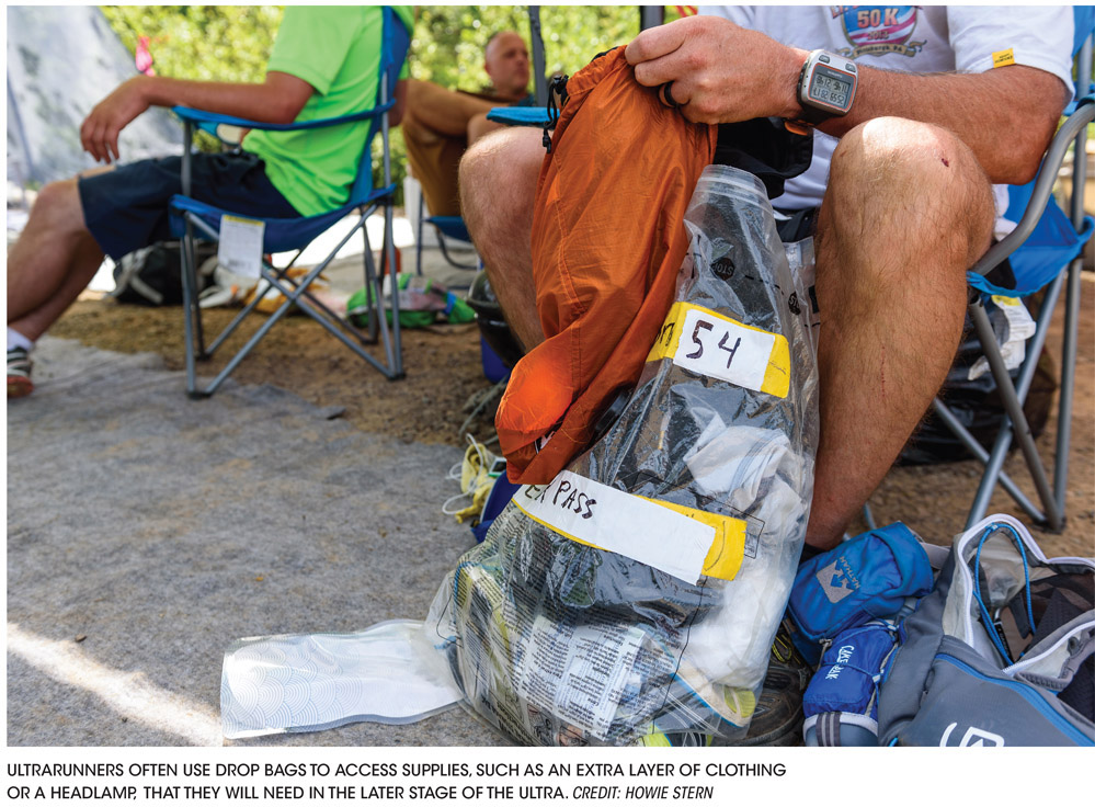 ULTRARUNNERS OFTEN USE DROP BAGS TO ACCESS SUPPLIES, SUCH AS AN EXTRA LAYER OF CLOTHING OR A HEADLAMP, THAT THEY WILL NEED IN THE LATER STAGE OF THE ULTRA. CREDIT: HOWIE STERN