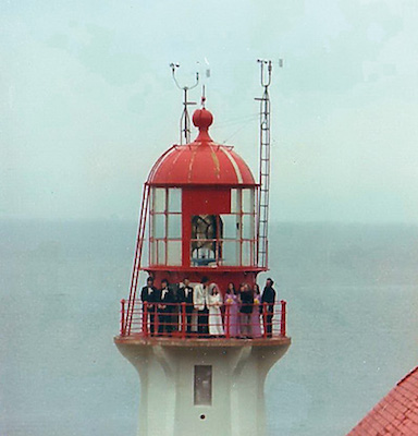 Wedding group on top of lighthouse