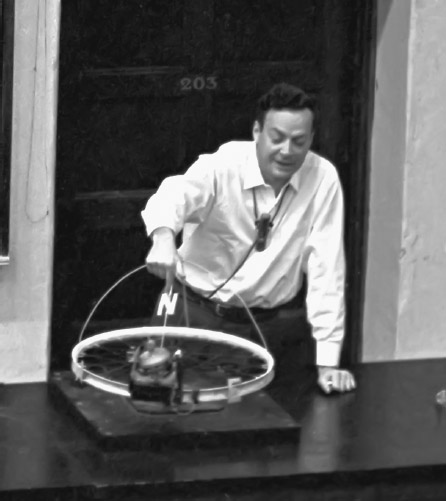 FIGURE 4-9 Feynman demonstrates an artificial gyrocompass.