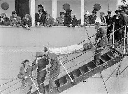 The badly injured survivors were the first to be transferred to the tender