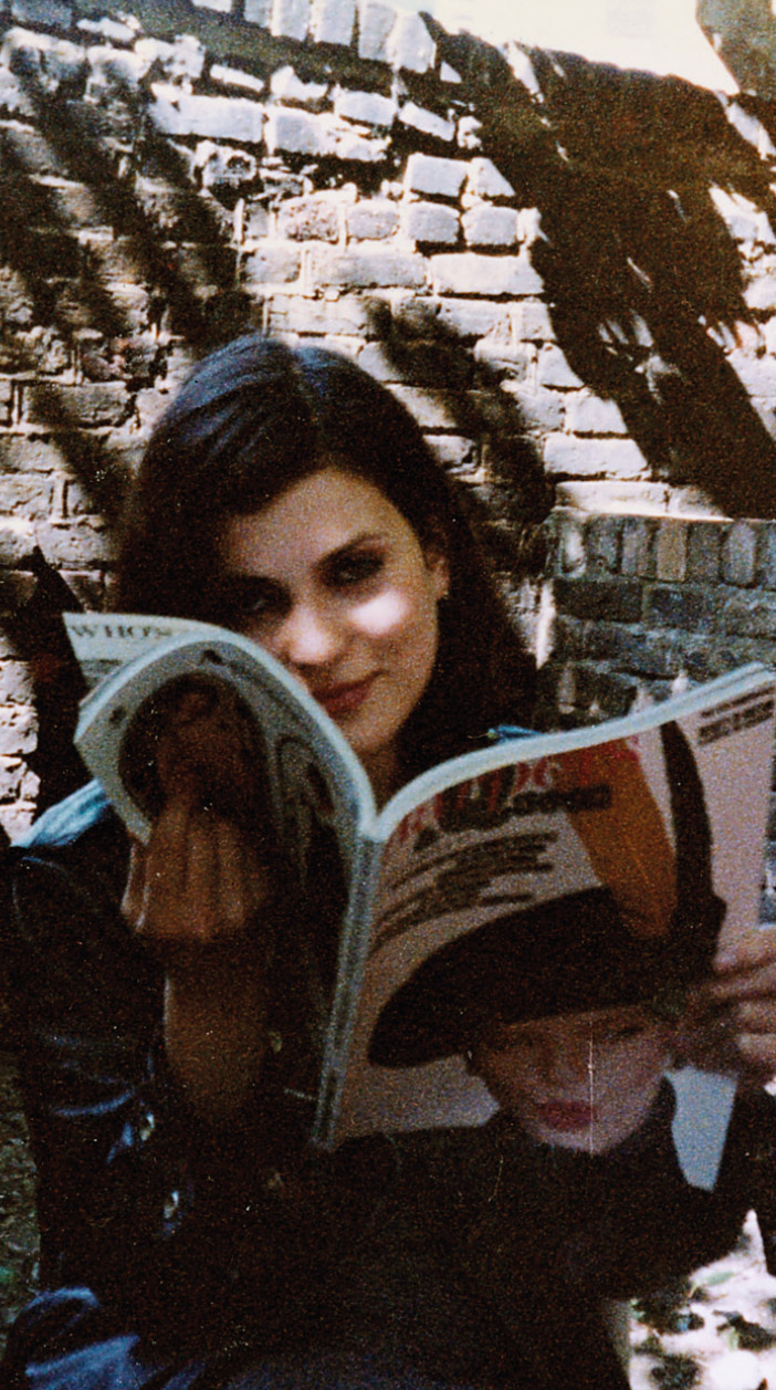 Evgenia Citkowitz, aged 17, reading Harpers & Queen in NC’s garden.