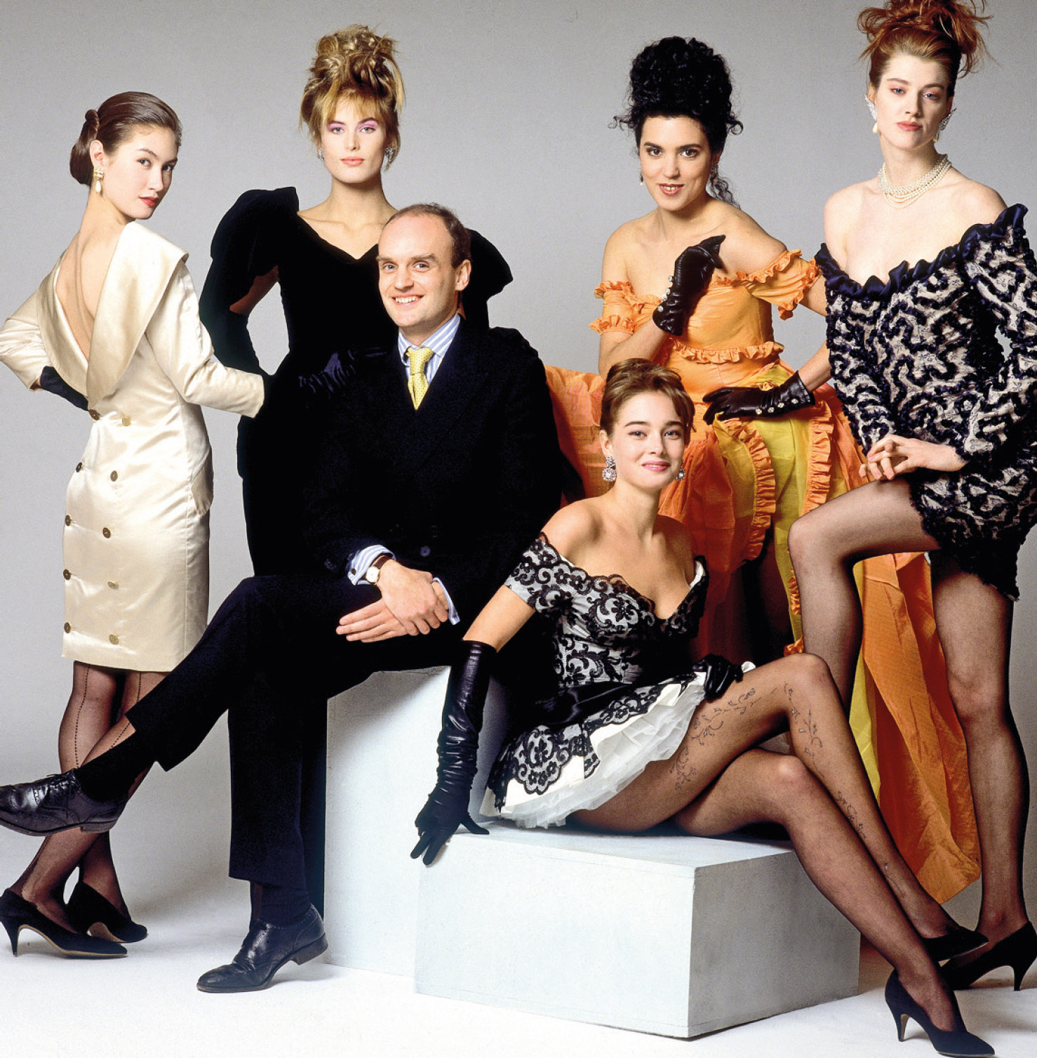 Five hired models make NC look a whole lot better in a 1988 publicity shot for The Fashion Conspiracy – A Remarkable Journey Through the Empires of Fashion. The photograph was taken by Clive Arrowsmith for the Mail on Sunday’s You Magazine. NC was Editor of Harpers & Queen at the time. The current whereabouts of the models is sadly unknown.