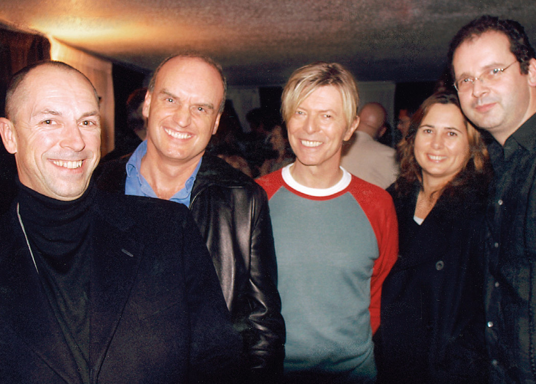 GQ Editor Dylan Jones, NC, David Bowie, Vogue Editor Alexandra Shulman and Vogue Creative Director Robin Derrick, backstage at Wembley Arena. The thirty-second conversation with Bowie was a highpoint of NC’s life.