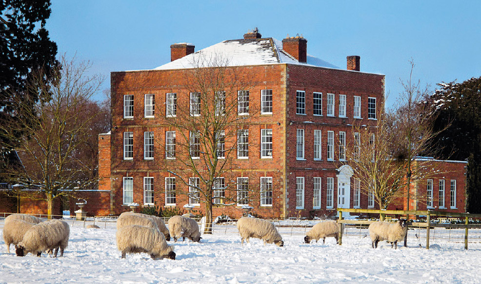 Wolverton Hall, near Pershore, Worcestershire, photographed in heavy snow. The house was built in 1709, architect unknown, with later additions.