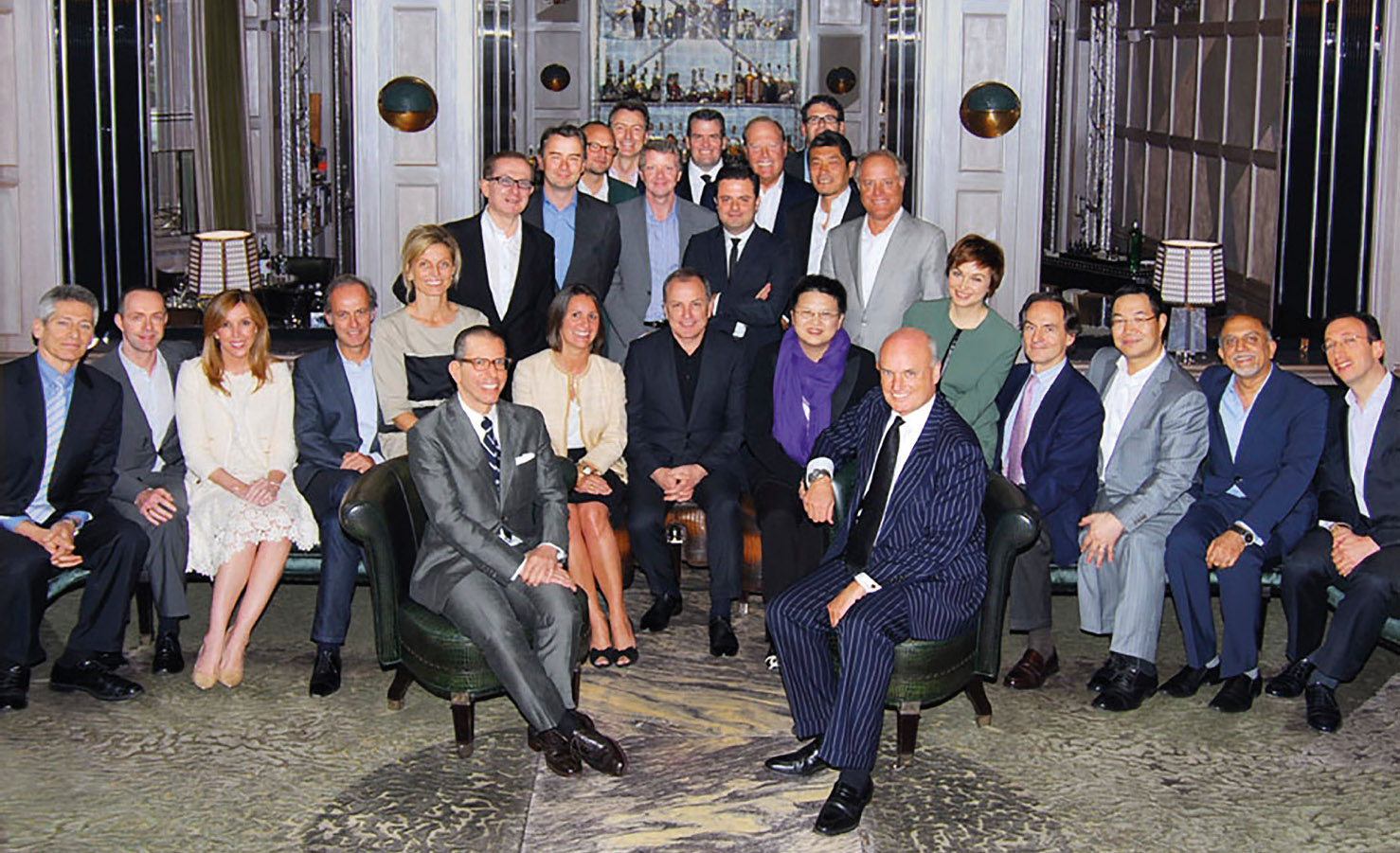 Presidents, Publishers and Senior Executives of Condé Nast International, circa 2012. Photographed in the bar of the Connaught hotel, London. A conspicuously large proportion of men in suits, some might observe.