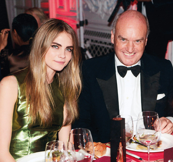 Supermodel and film star Cara Delevingne with her godfather NC, who is probably about to slip her £20 for her birthday. At the British Style Awards, Savoy hotel.