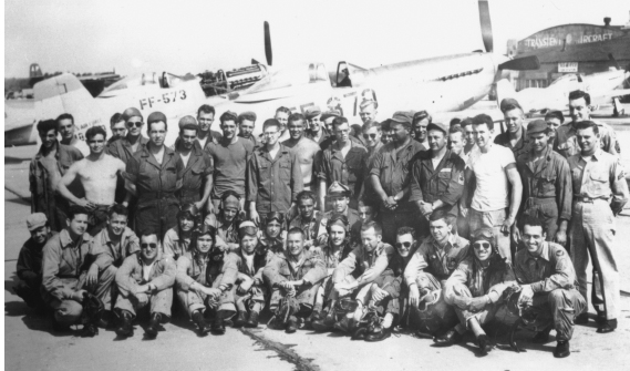 The aspiring pilot (seated second from left) with other members of the 82nd Squadron at Grenier Air Field (1948) COURTESY TOM HILDRETH, DAVE MCLAREN, AND LT. COL. O’DONNELL