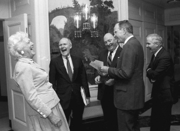 President and Mrs. Bush share a laugh with Scowcroft, Robert Gates, and Marlin Fitzwater in the Diplomatic Reception Room (June 20, 1991). GEORGE BUSH PRESIDENTIAL LIBRARY AND MUSEUM