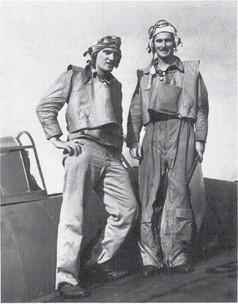Ensigns Earl Steiger and William Hall, VF-71, 27 Aug. 1942, after downing Spec. Duty Lt. (jg) Hayashi’s Type 2 flying boat. (NA 80-G-12997)