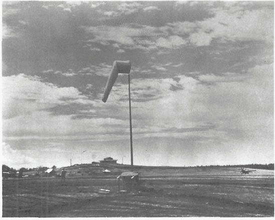 Pagoda Hill, with the RADAR ONE antenna beyond on the left and the VF-5 ready tent in the left foreground. (NA 80-G-20673)