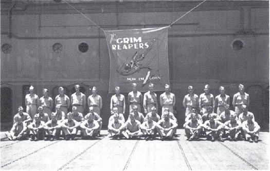 VF-10, 23 Oct. 1942. Top row (l to r): Greene, Harman, Coalson, Boren, Kilpatrick, Rhodes, Reding, Mead, Leppla, Kona, Fulton, Davis, Pollock.
