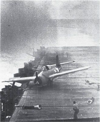 Ens. Phil Souza’s F-25 (BuNo. 5246) from VF-72 slides on the Enterprise’s deck during the Junyō’s attack, 26 Oct. 1942.