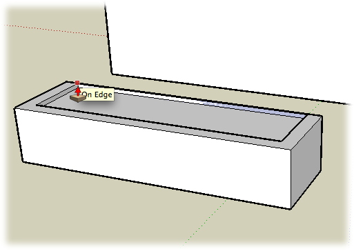 Using the Push/Pull tool, you remove the back wall of the planter. Click the inside face of the back wall, and then click one of the back edges to remove the wall.