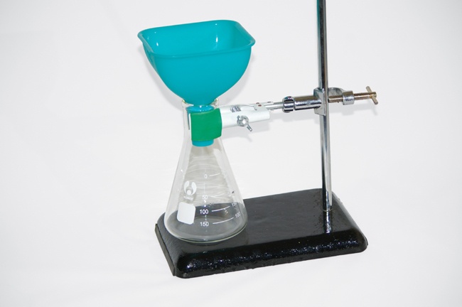 A utility clamp supporting an Erlenmeyer flask